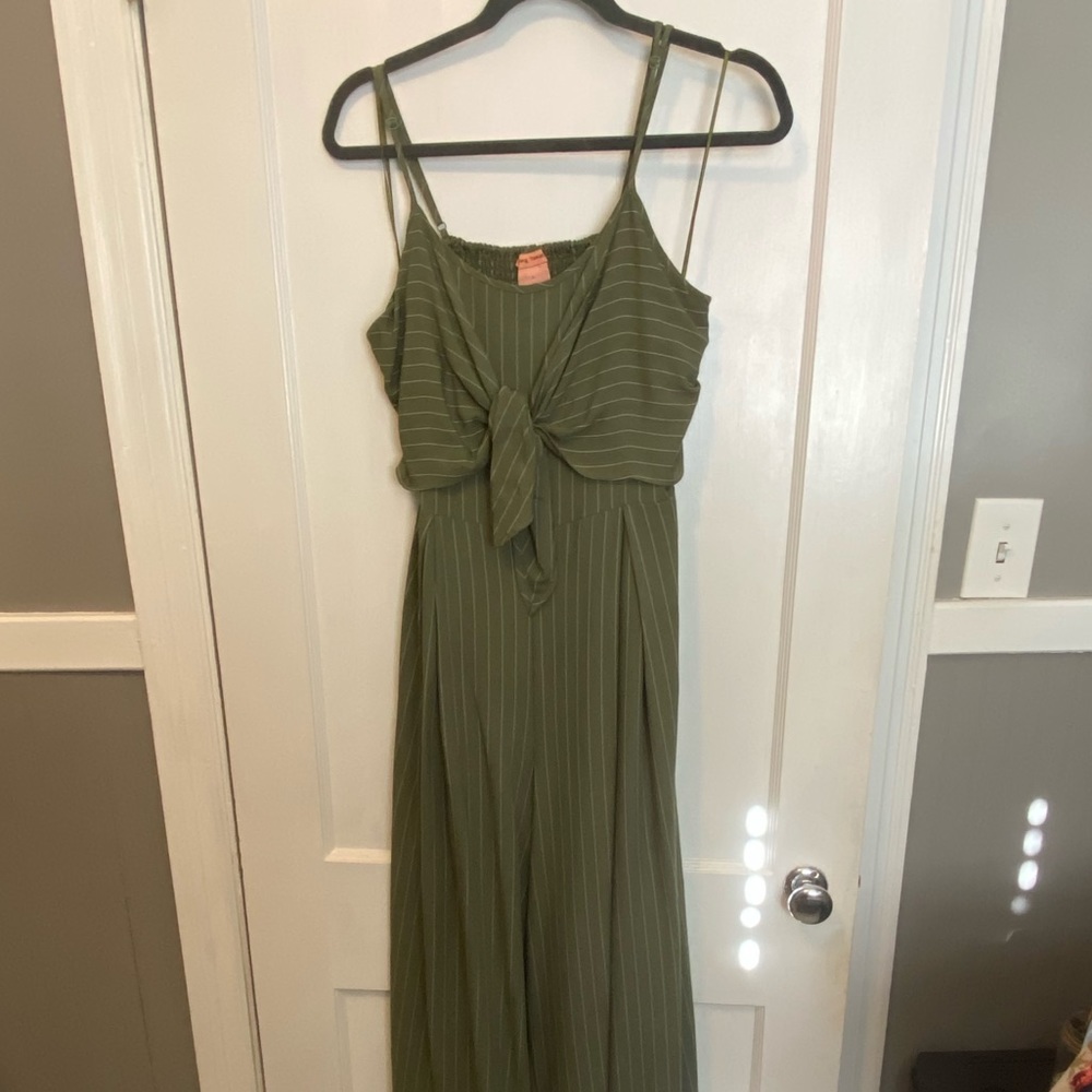 Olive green and white pinstripe jumpsuit